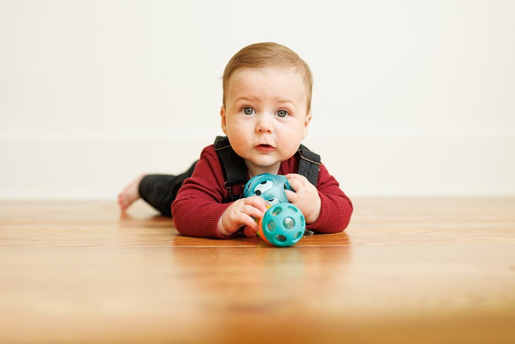 Milestone Session with boy and his toy
