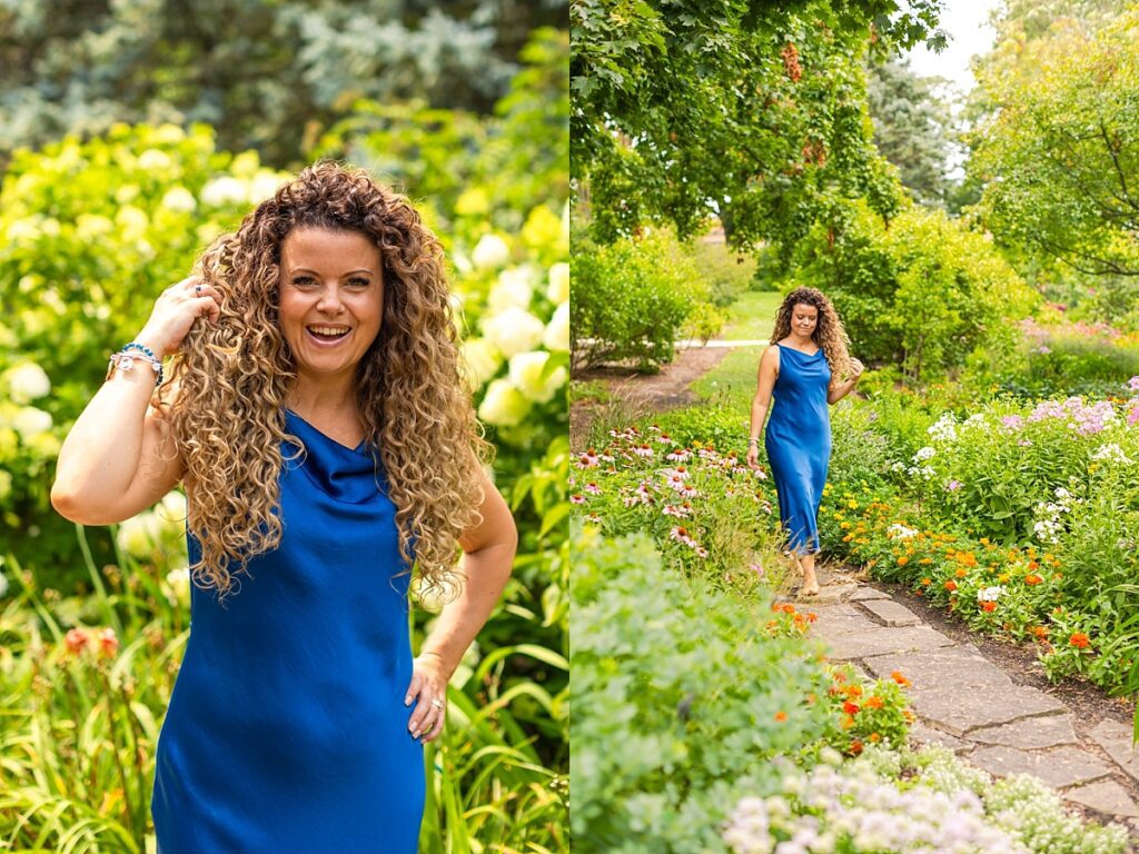 business owner walking down stone path in wildflower garden for branding photos