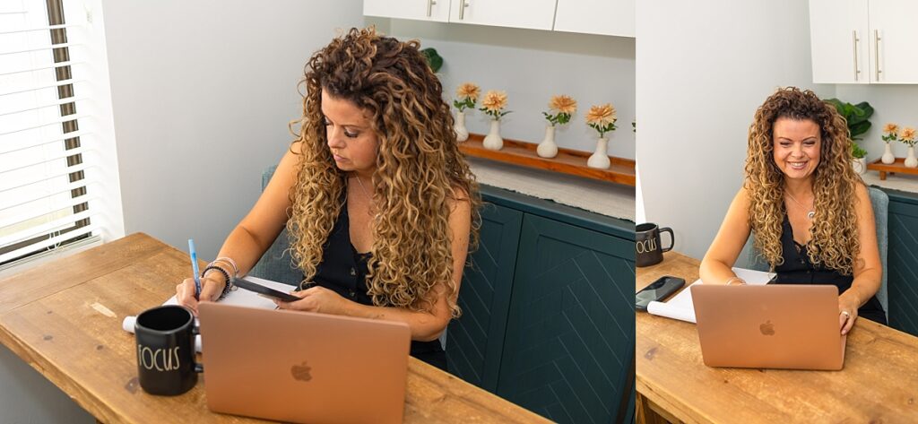 woman sitting at desk working on laptop and writing on a notepad