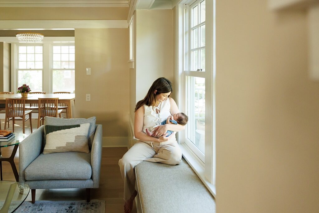 Mom and Newborn Girl Photos in Window Seat
